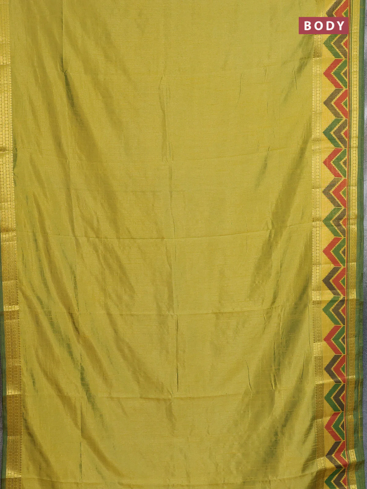 Semi tussar saree light green with plain body and ikat woven zari border - Image 2