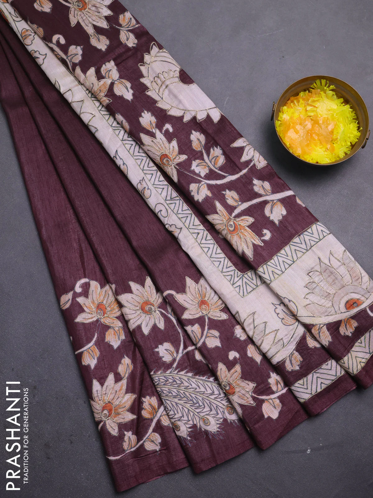 Semi tussar saree maroon with plain body and embroidered pallu