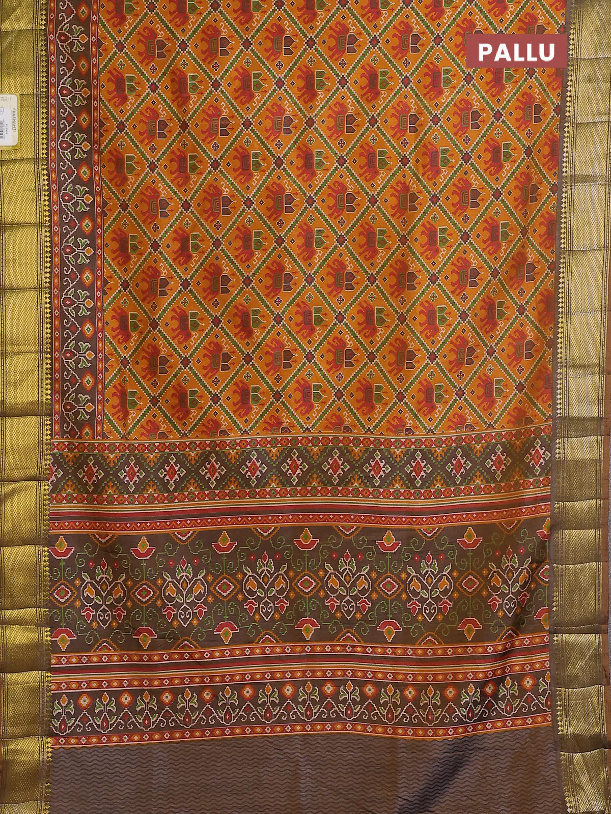 Semi tussar saree mustard yellow and brown shade with allover ikat prints and zari woven border - Image 3