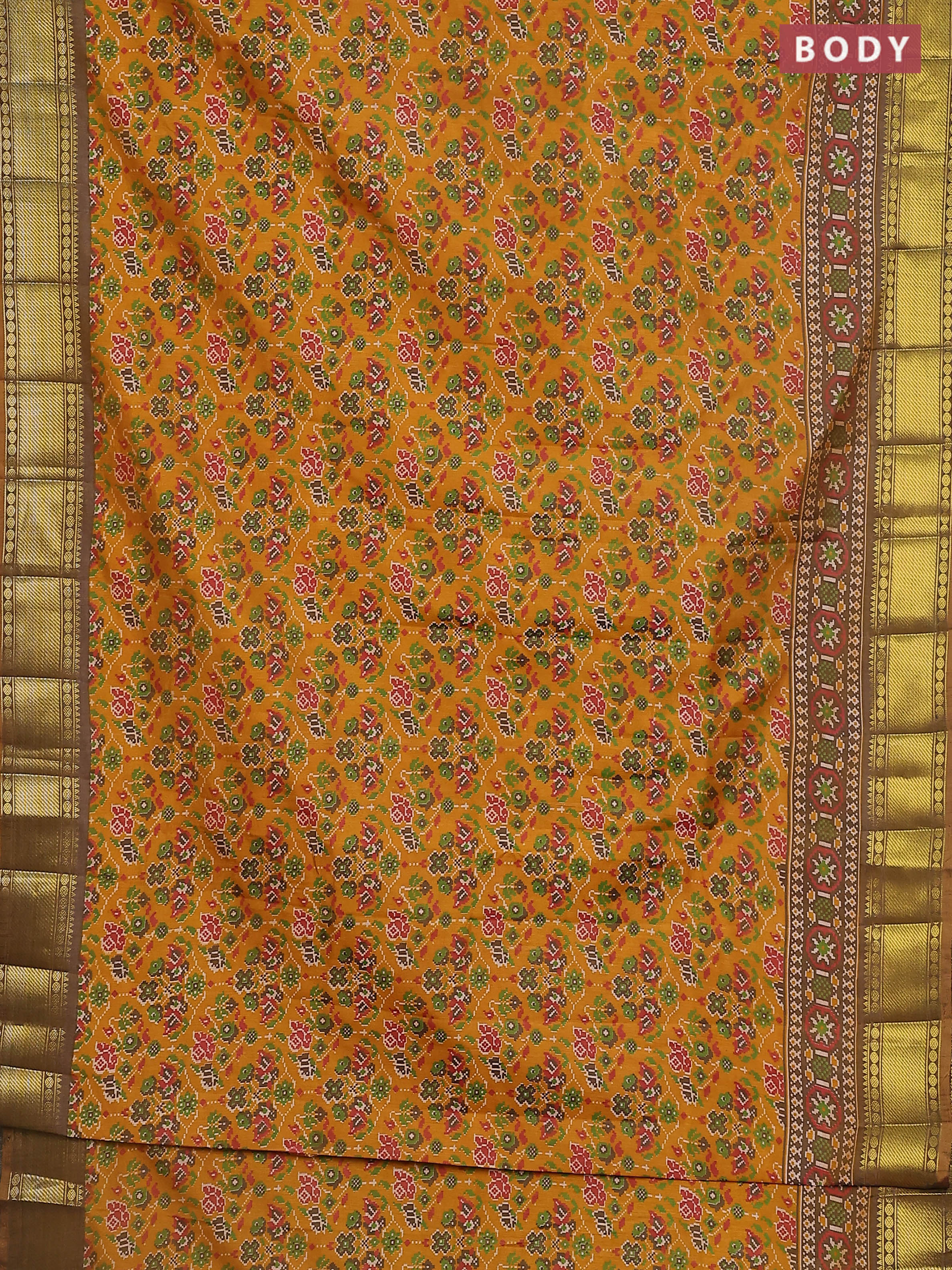 Semi tussar saree mustard yellow and brown shade with allover ikat prints and zari woven border - Image 2
