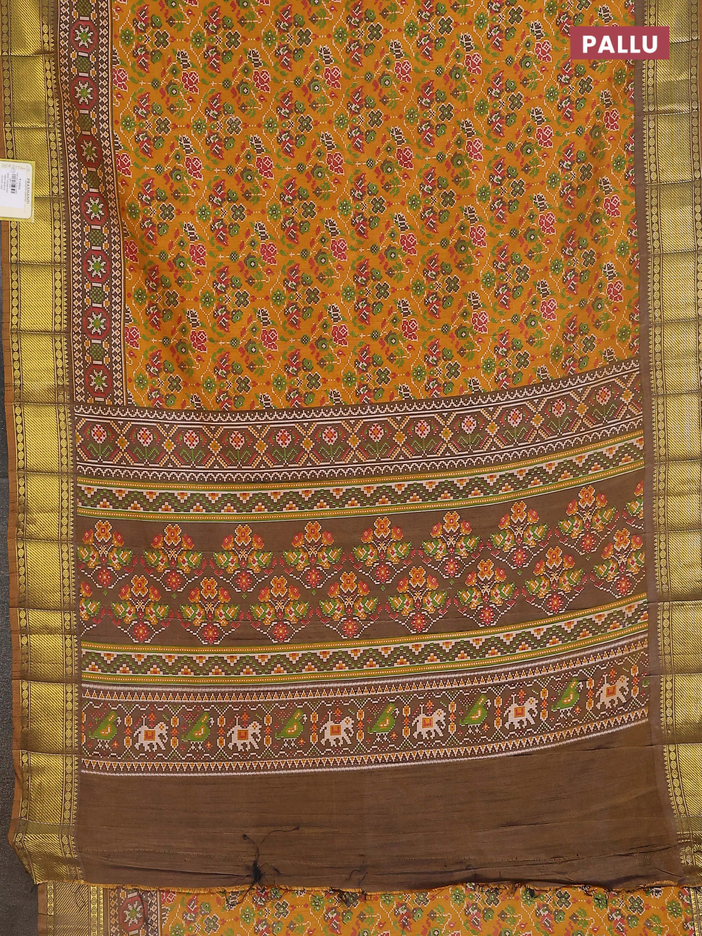 Semi tussar saree mustard yellow and brown shade with allover ikat prints and zari woven border - Image 3