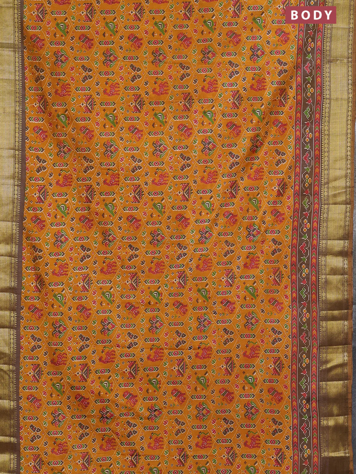 Semi tussar saree mustard yellow and brown with allover ikat prints and zari woven border - Image 2