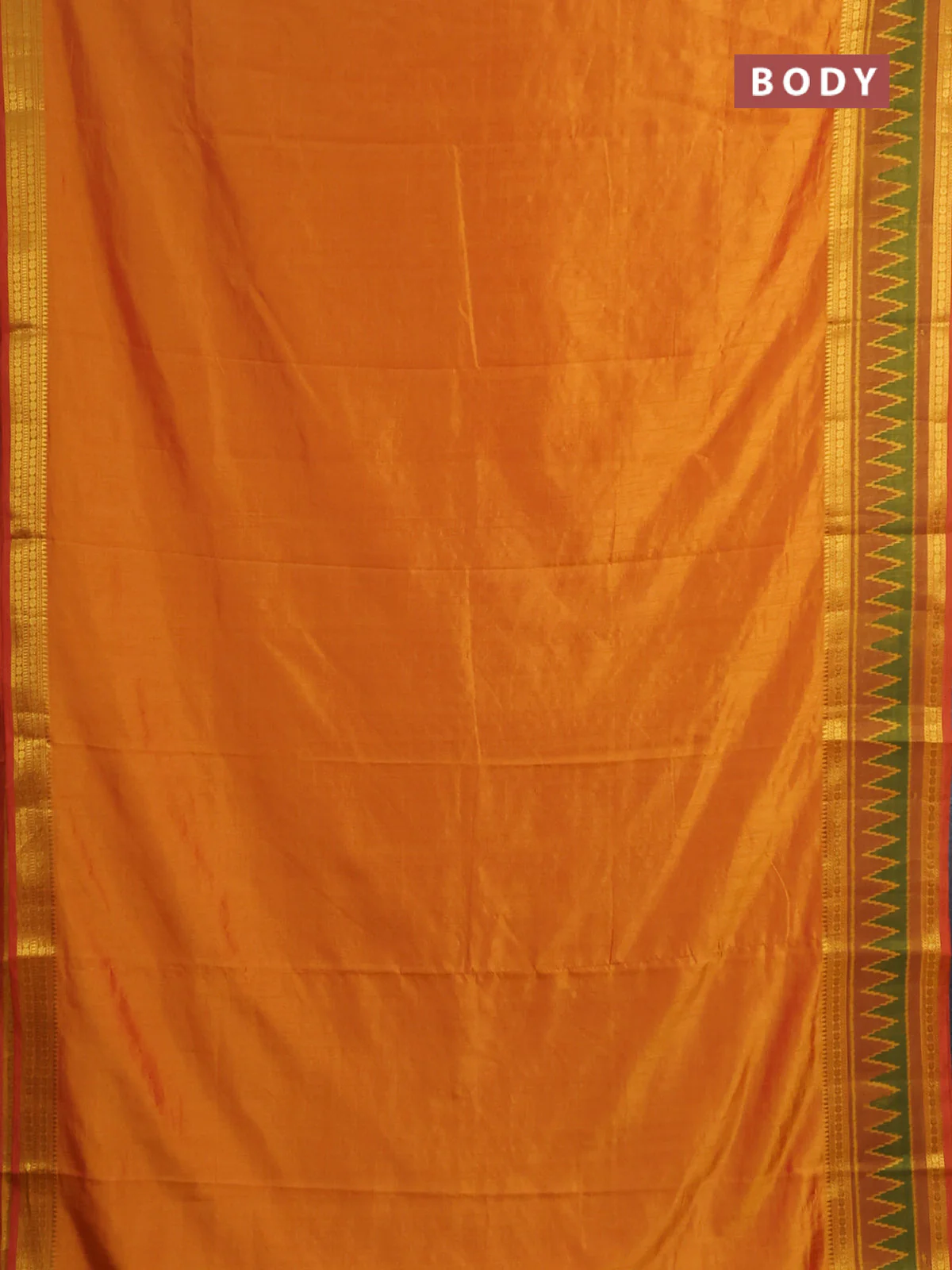 Semi tussar saree mustard yellow with plain body and ikat woven zari border - Image 2