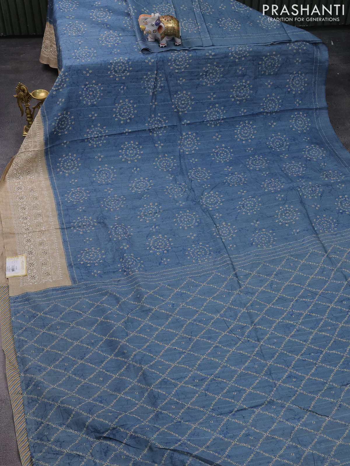 Semi tussar saree pastel blue and beige with allover bandhani prints and embroidery cut work border - Image 2