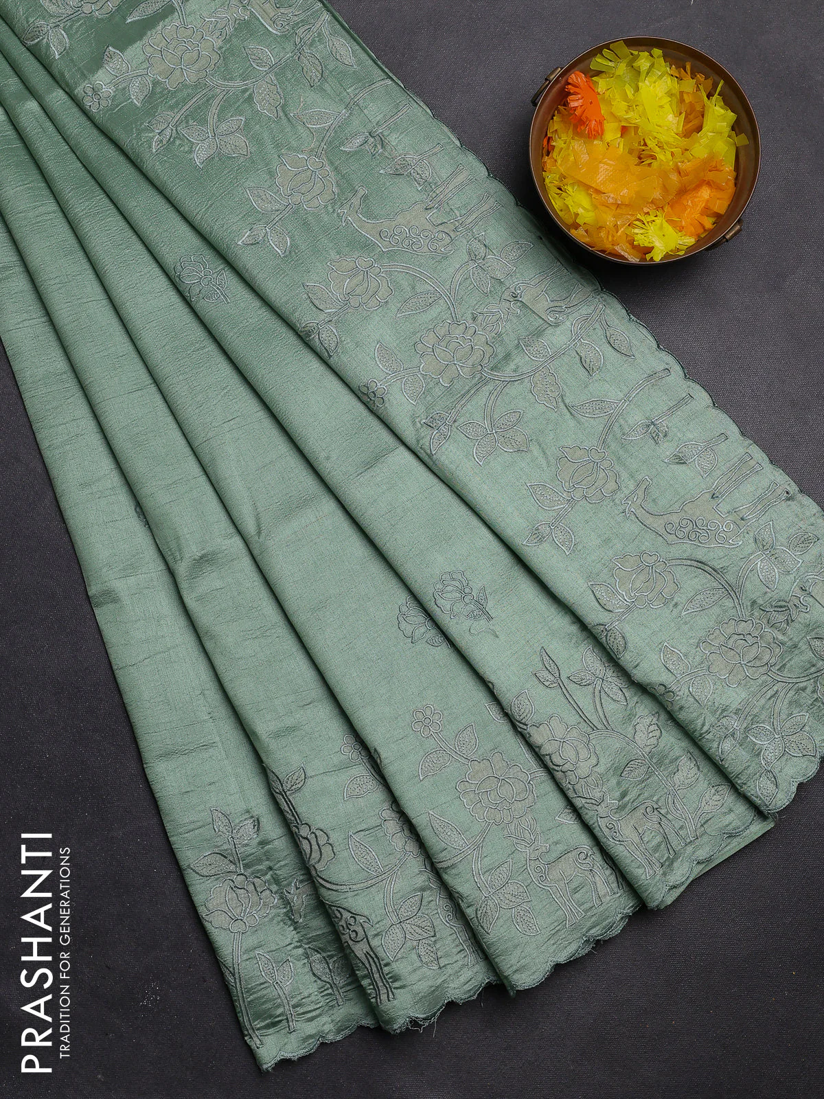 Semi tussar saree pastel green with floral embroidery work and applique work border