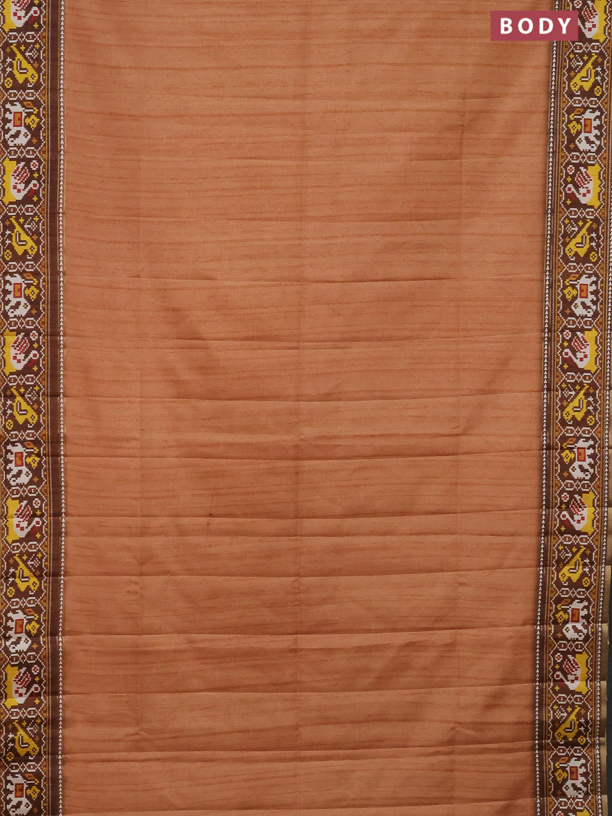 Semi tussar saree peach orange and brown with plain body and patola printed border - Image 2