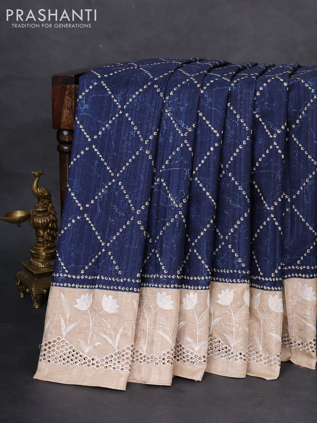 Semi tussar saree peacock blue and beige with allover bandhani prints and embroidery cut work border