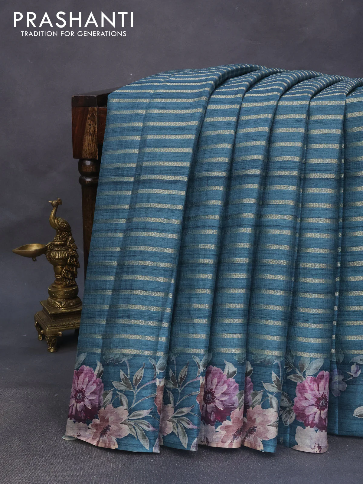 Semi tussar saree peacock green with allover zari woven stripes pattern and floral printed border - Image 2
