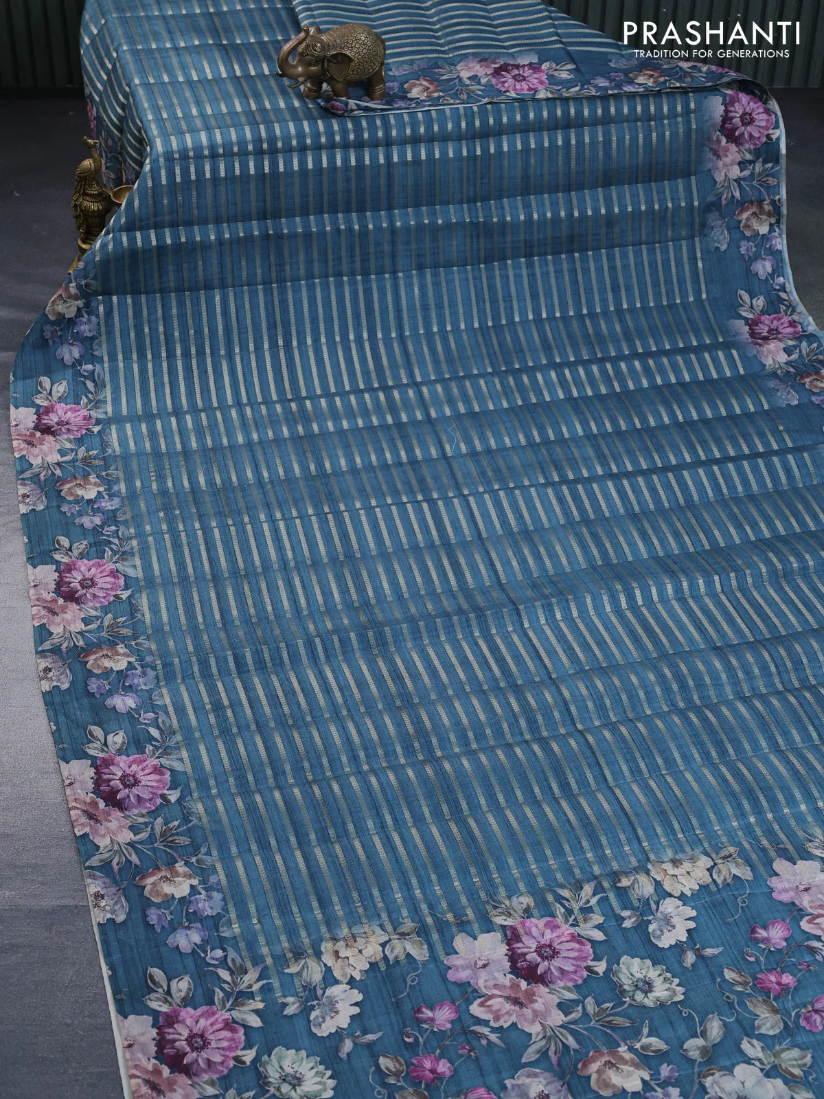 Semi tussar saree peacock green with allover zari woven stripes pattern and floral printed border - Image 3