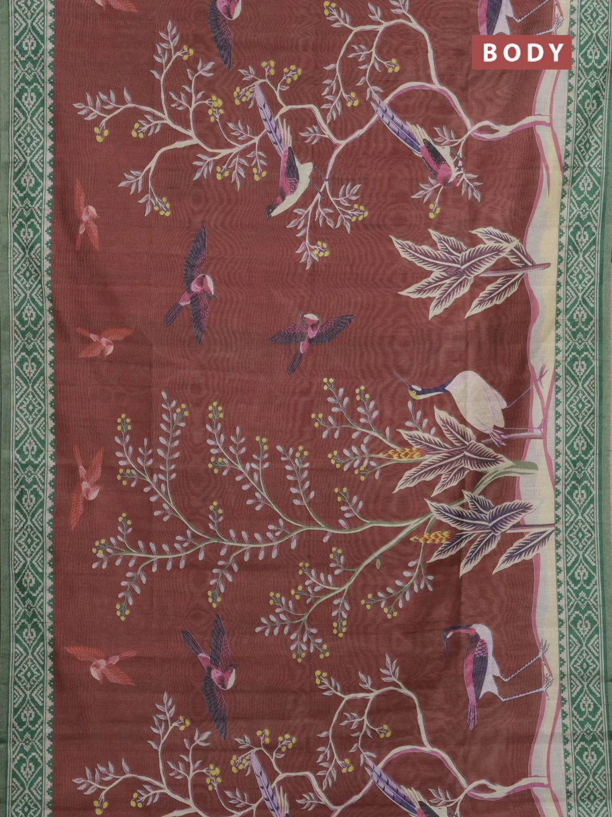 Semi tussar saree rust shade and green with allover prints and printed zari border - Image 2