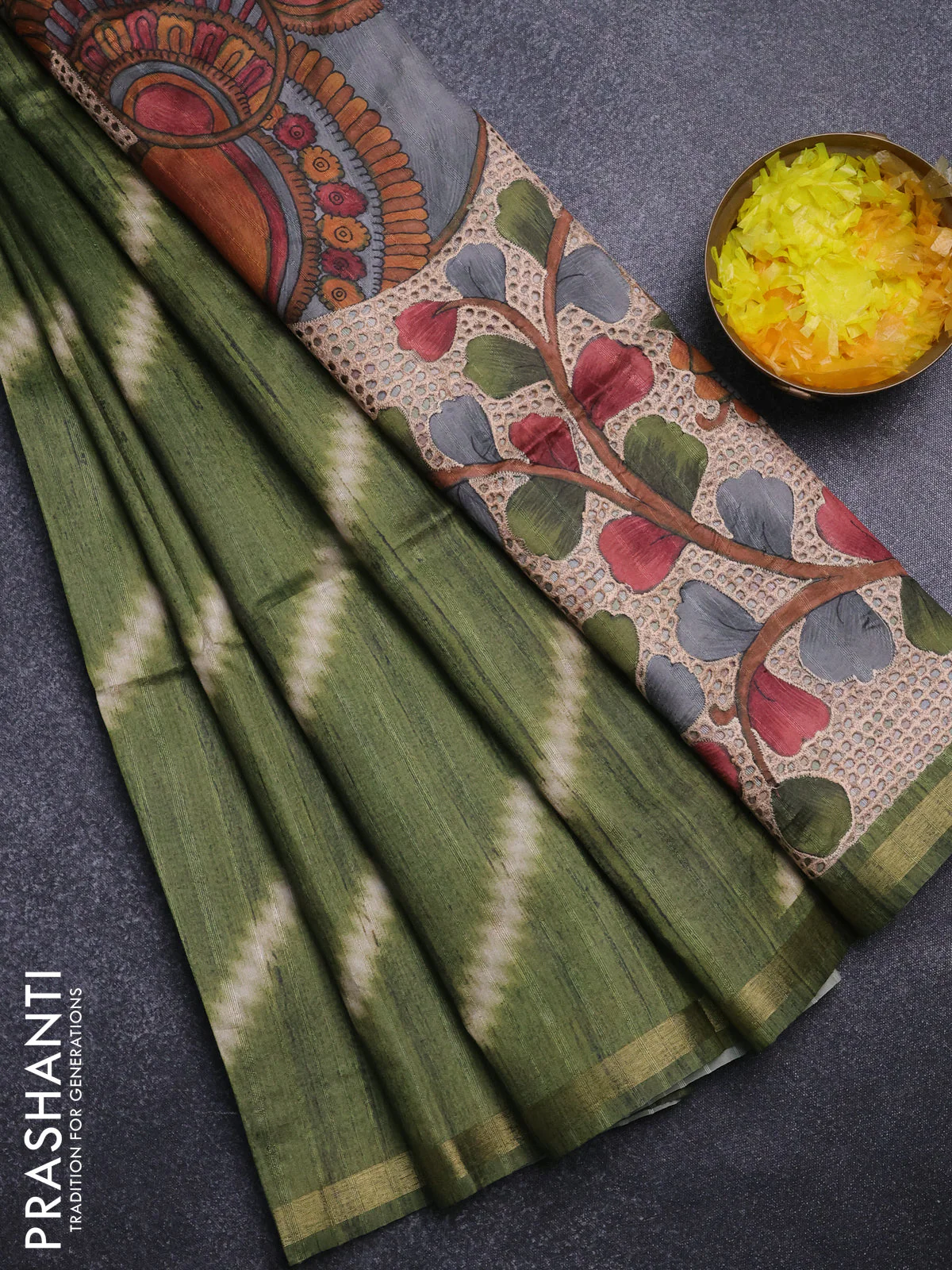 Semi tussar saree sap green with leheriya prints and kalamkari prints & cut work pallu