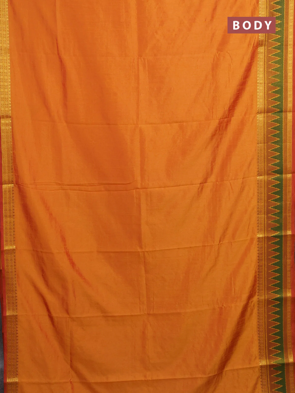 Semi tussar saree sunset orange and dark mustard with plain body and ikat woven zari border - Image 2