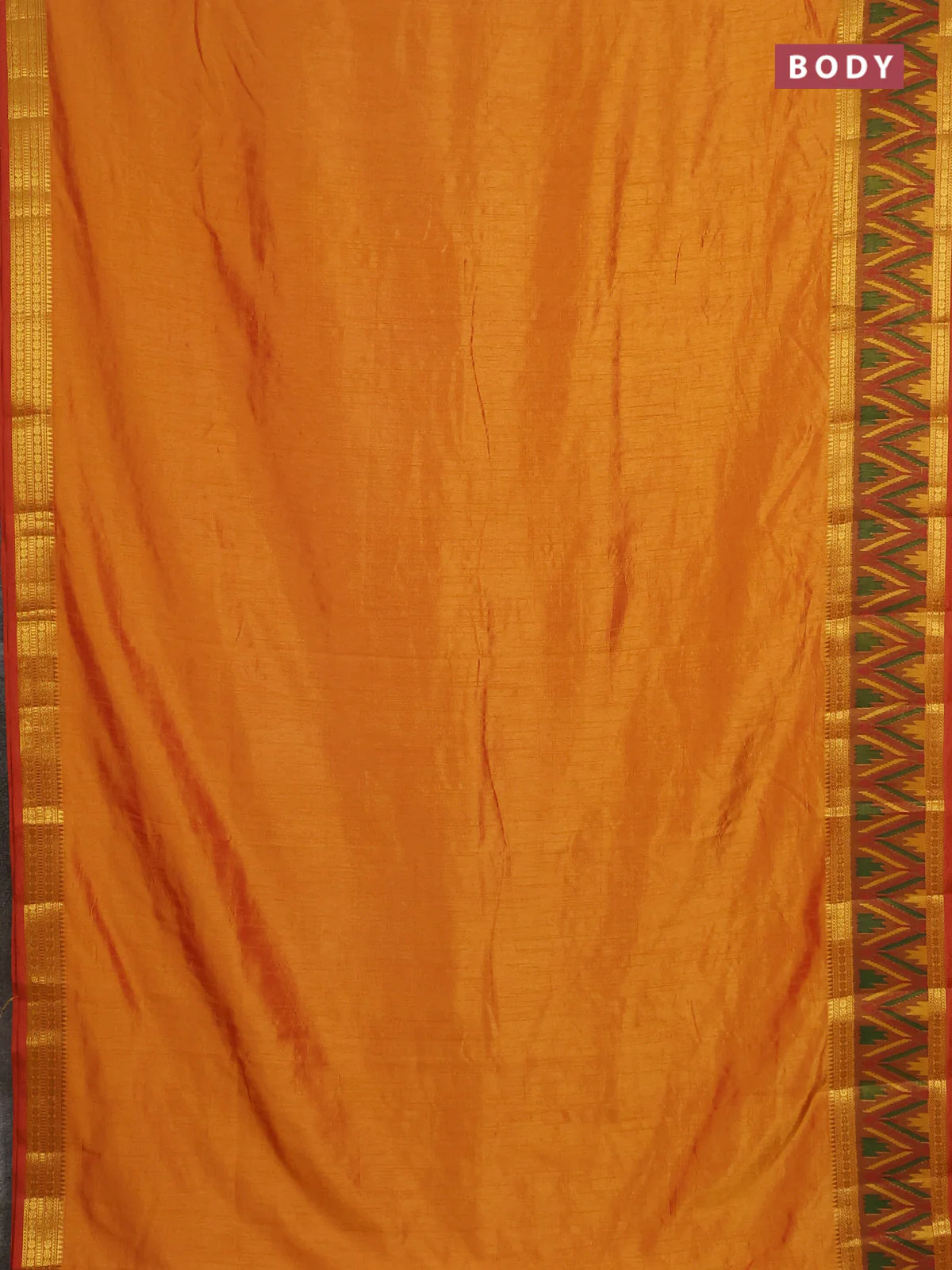 Semi tussar saree sunset orange and dark mustard with plain body and ikat woven zari border - Image 2
