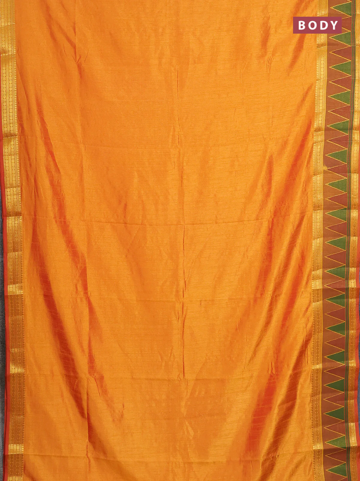 Semi tussar saree sunset orange and dark mustard with plain body and ikat woven zari border - Image 2