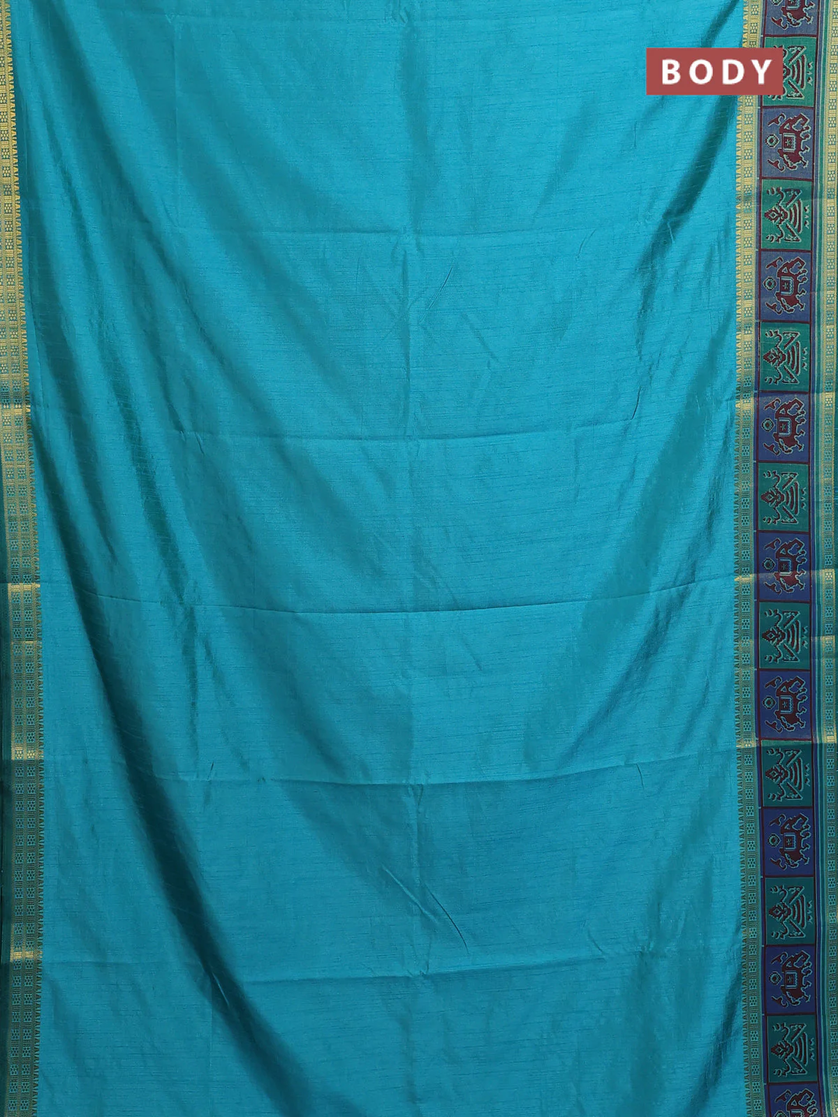 Semi tussar saree teal blue with plain body and ikat woven zari border - Image 2