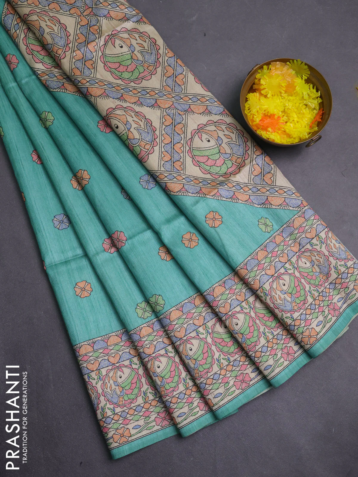 Semi tussar saree teal green and beige with allover butta prints and madhubani printed pallu & border