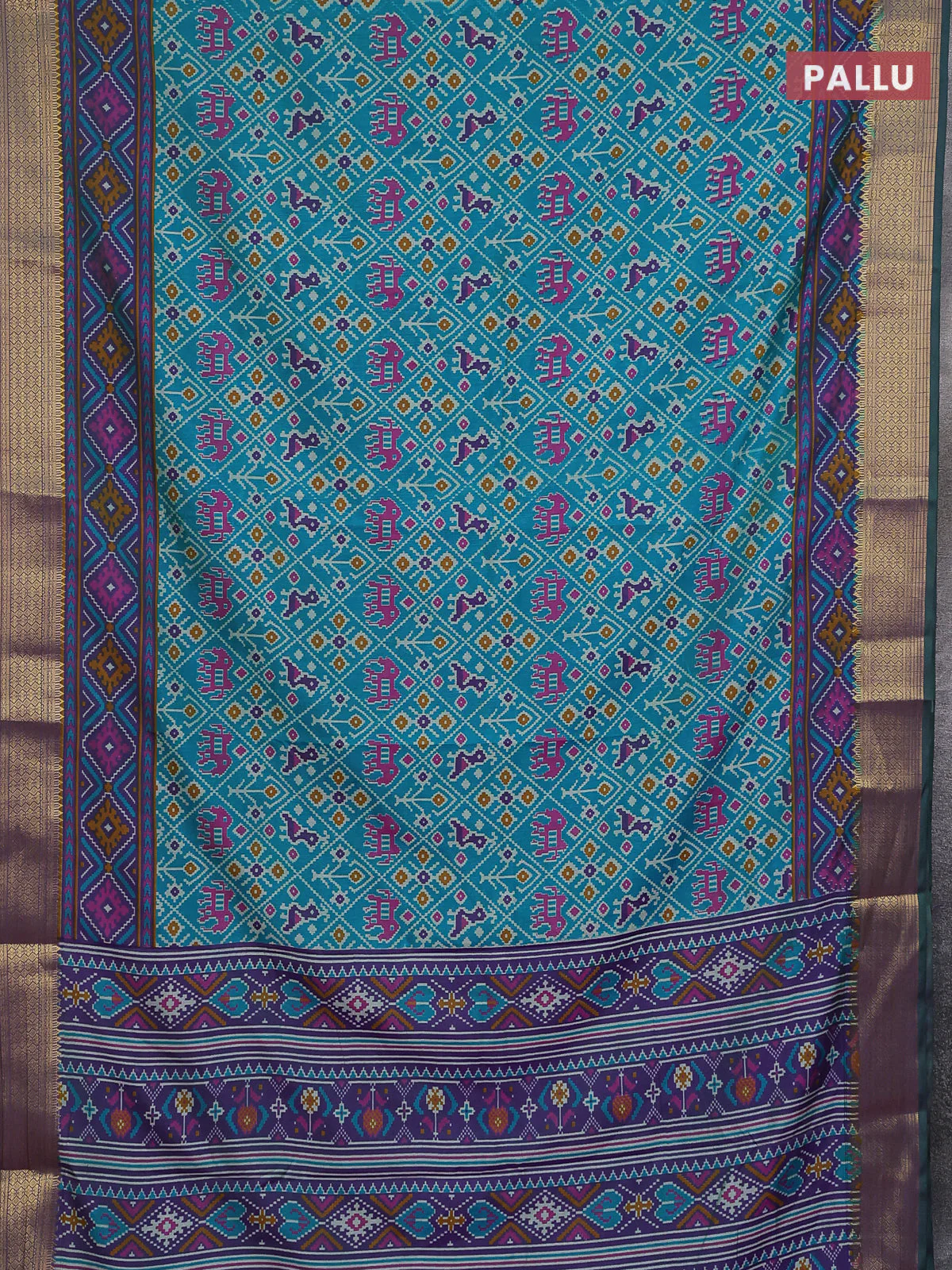 Semi tussar saree teal greenish blue and purple with allover ikat prints and zari woven border - Image 3