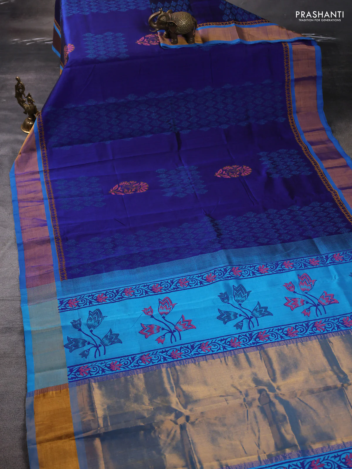 Silk cotton block printed saree blue and cs blue with allover prints and zari woven border - Image 2