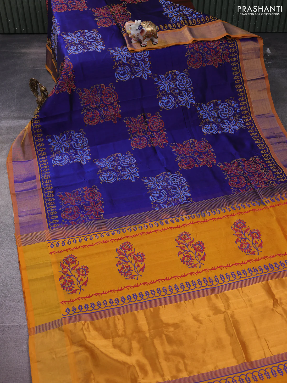 Silk cotton block printed saree blue and yellow with allover prints and zari woven border - Image 2