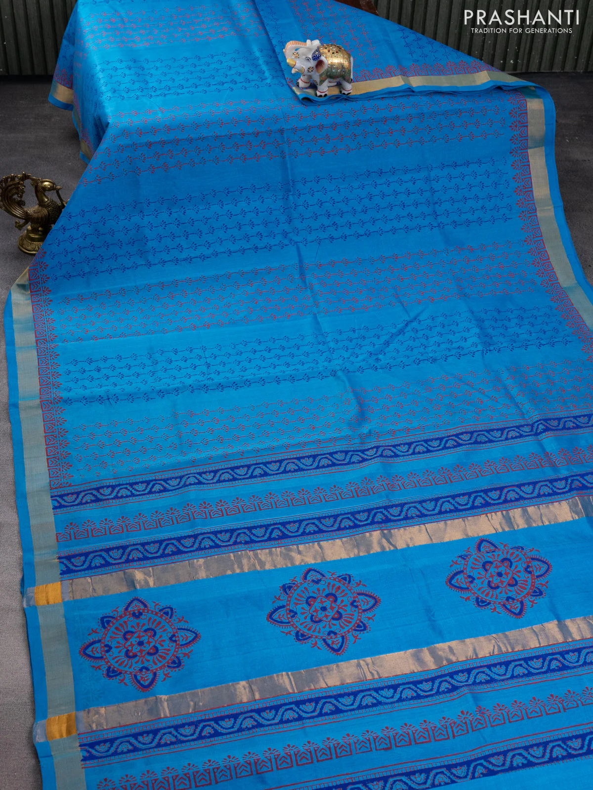 Silk cotton block printed saree cs blue with allover prints and zari woven border - Image 2