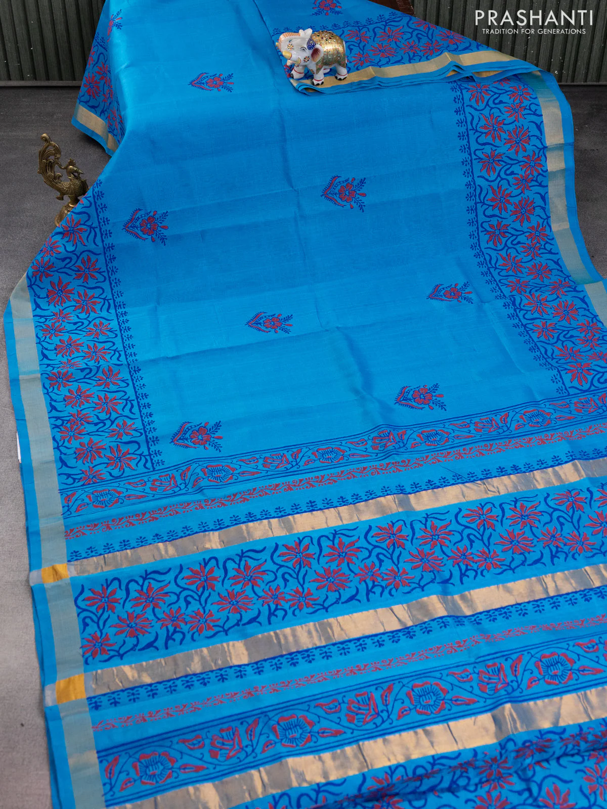 Silk cotton block printed saree cs blue with allover prints and zari woven border - Image 2