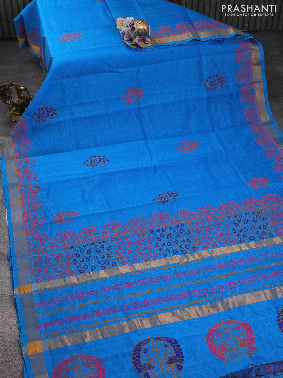 Silk cotton block printed saree cs blue with allover prints and zari woven border - Image 2