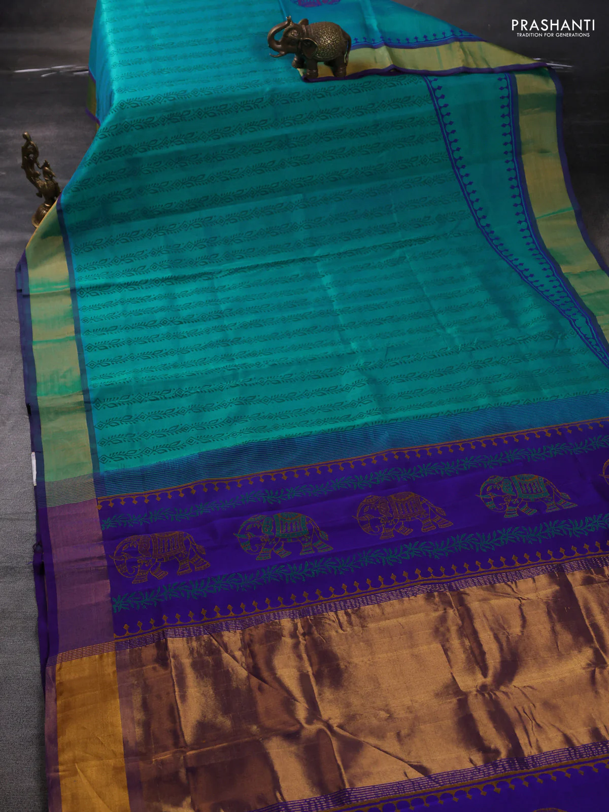 Silk cotton block printed saree dual shade of teal bluish green and violet with allover prints and zari woven border - Image 2