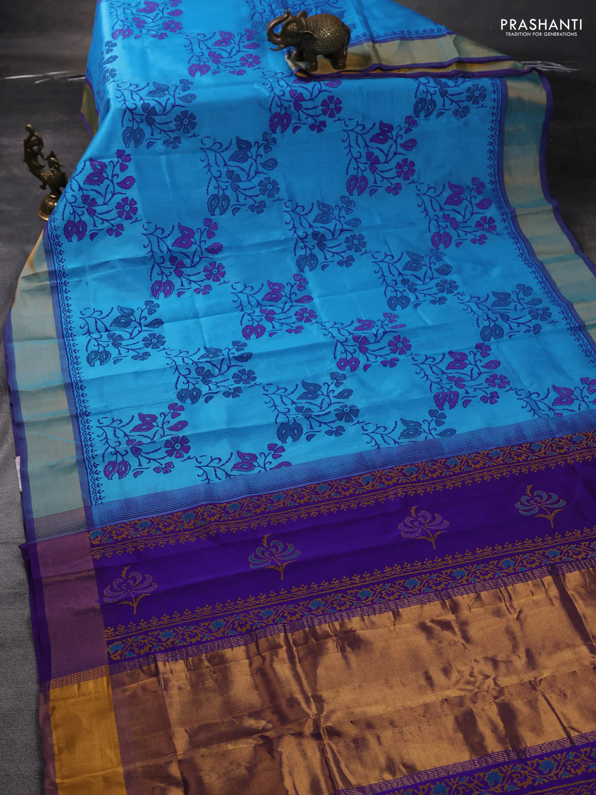 Silk cotton block printed saree light blue and blue with allover floral prints and zari woven border - Image 2