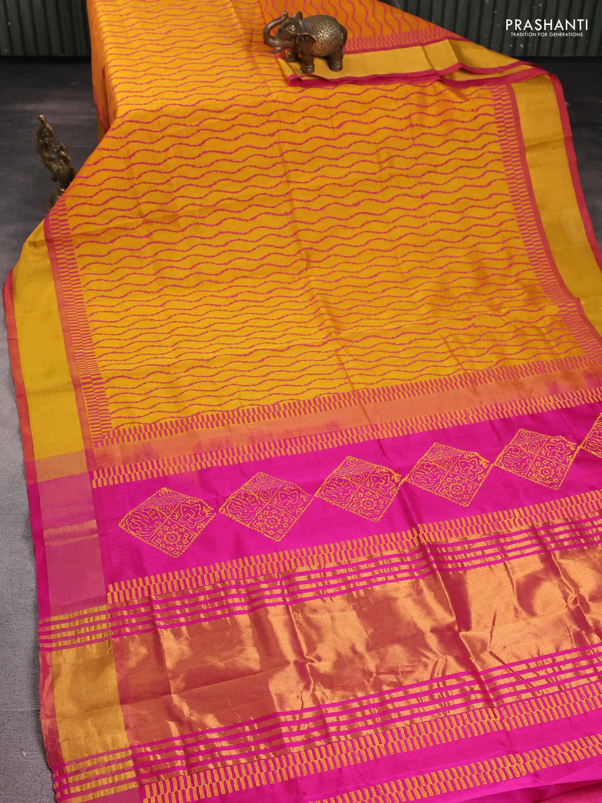 Silk cotton block printed saree mango yellow and pink with allover prints and zari woven border - Image 2