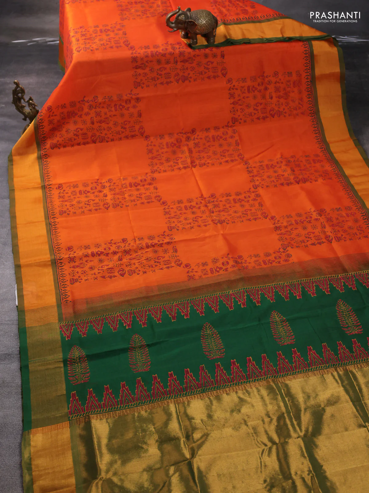 Silk cotton block printed saree orange and green with allover prints and zari woven border - Image 2