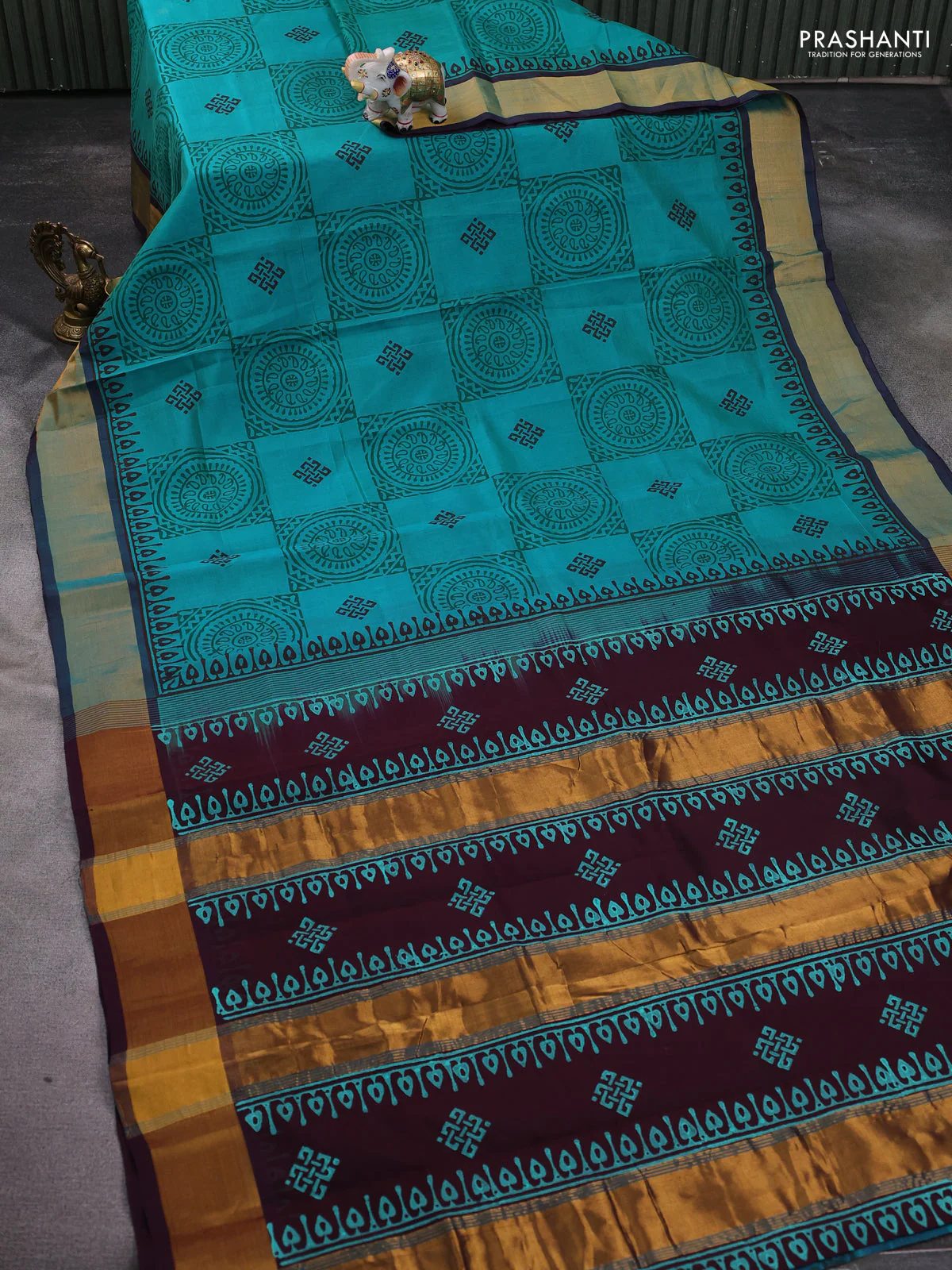 Silk cotton block printed saree teal green shade and wine shade with allover prints and zari woven border - Image 2