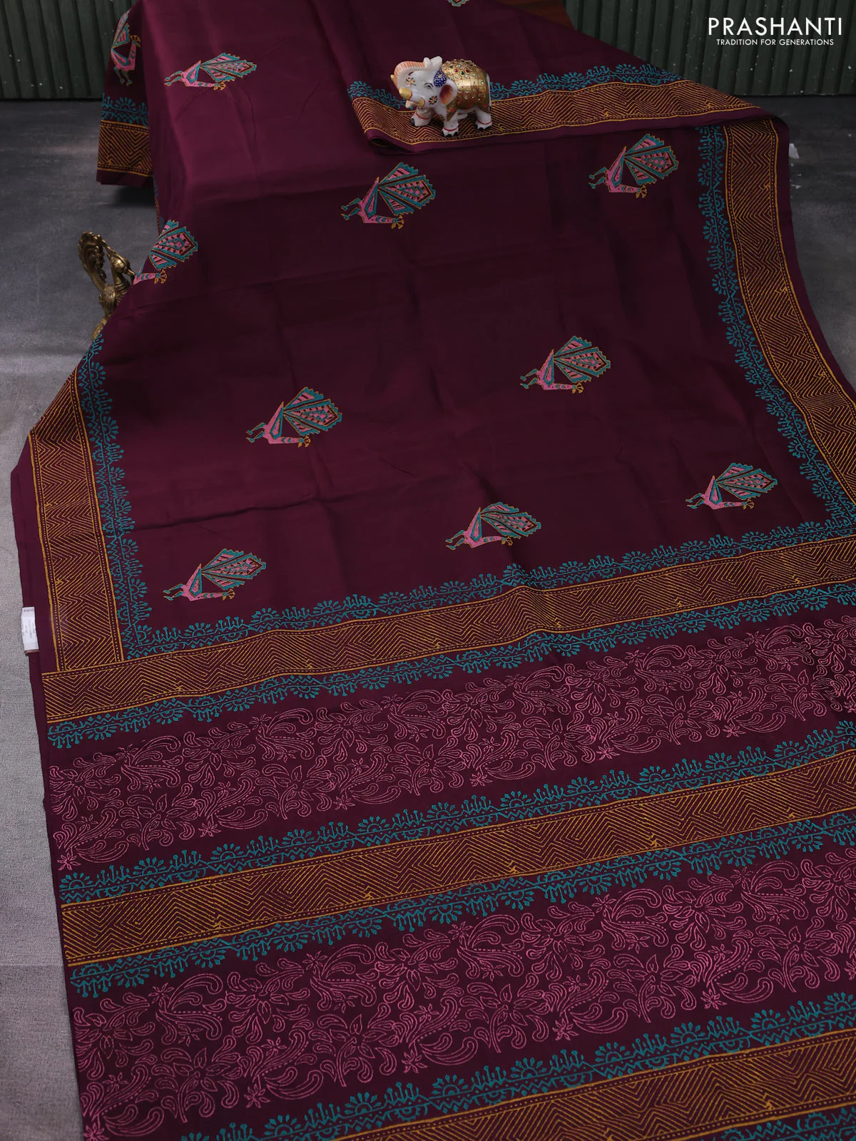 Silk cotton block printed saree wine shade and witgh peacock butta prints and printed border - Image 2