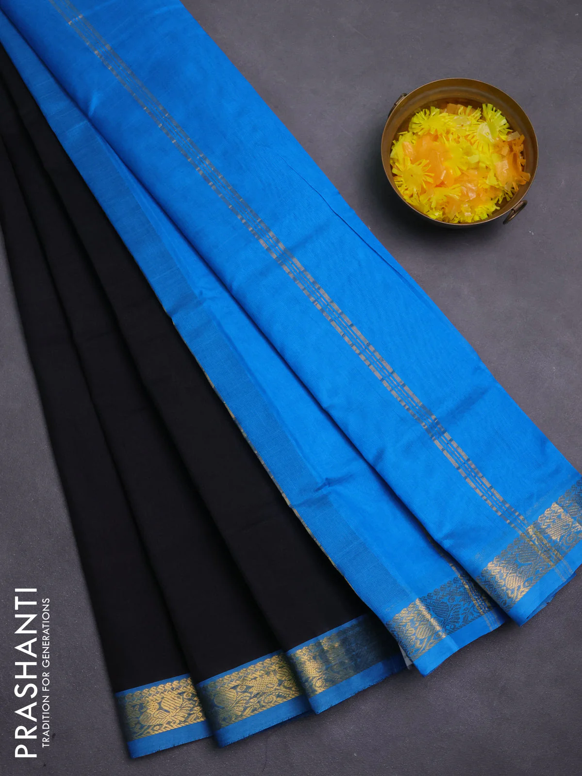 Silk cotton saree black and cs blue with plain body and annam zari woven border