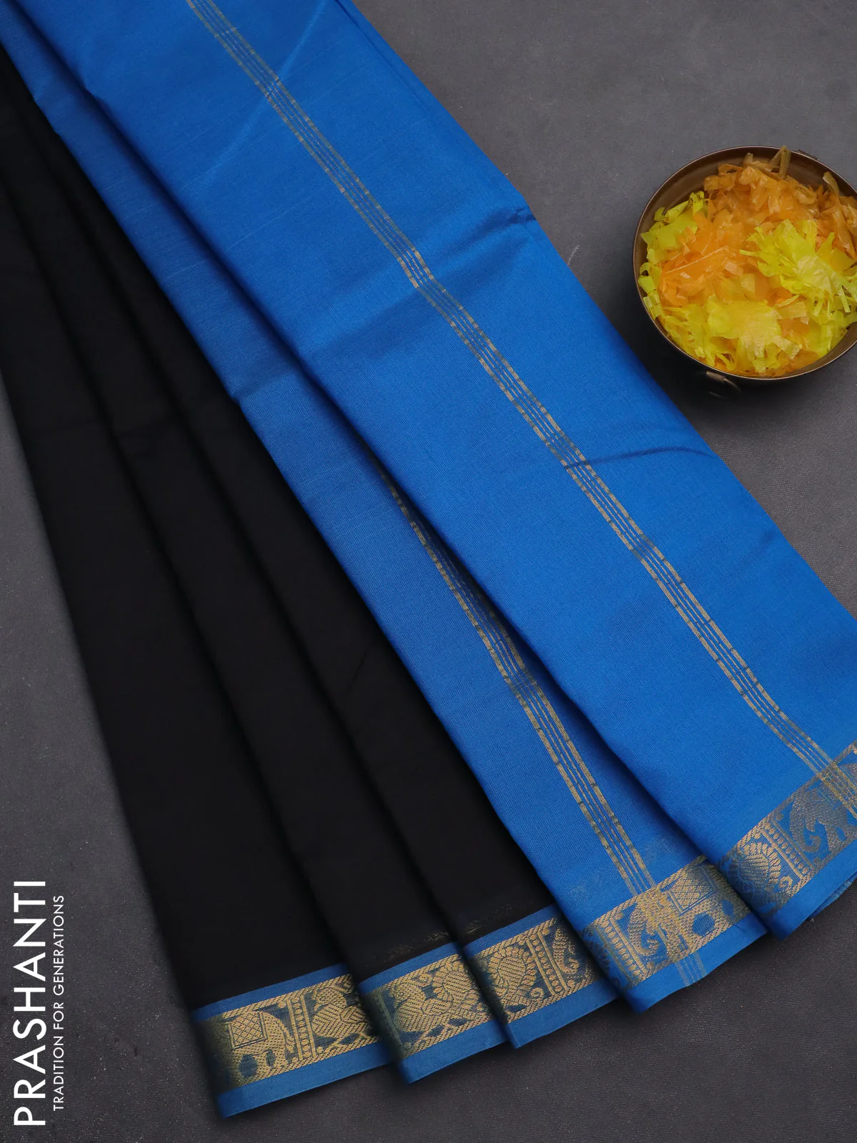 Silk cotton saree black and cs blue with plain body and zari woven border