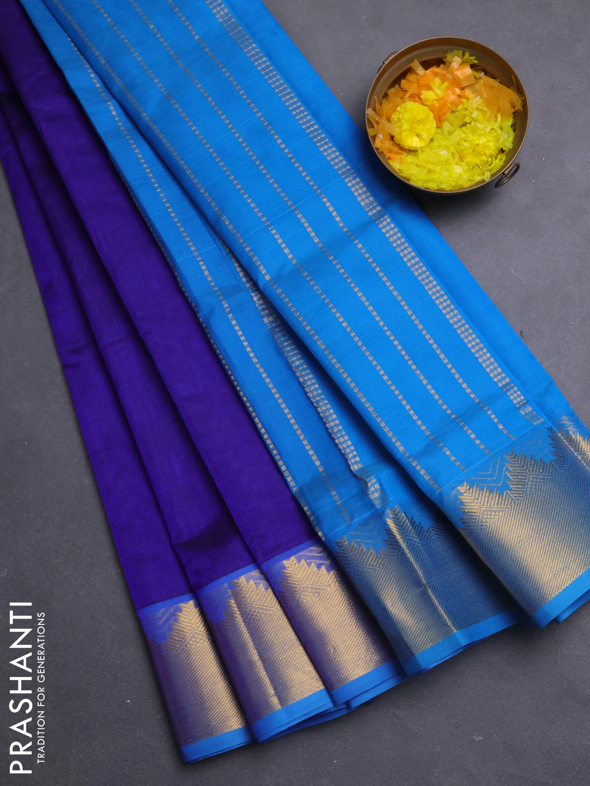 Silk cotton saree blue and cs blue with plain body and temple zari woven border