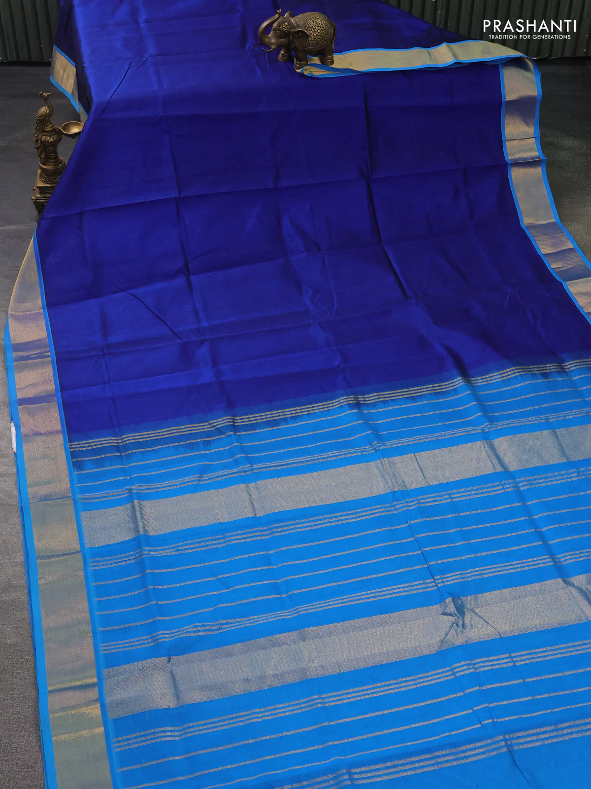 Silk cotton saree blue and cs blue with plain body and zari woven border - Image 2