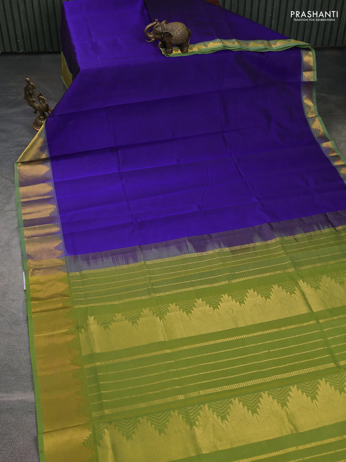 Silk cotton saree blue and light green with plain body and temple zari woven border - Image 2