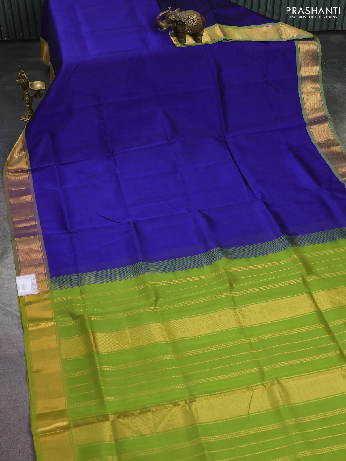 Silk cotton saree blue and light green with plain body and zari woven border - Image 2