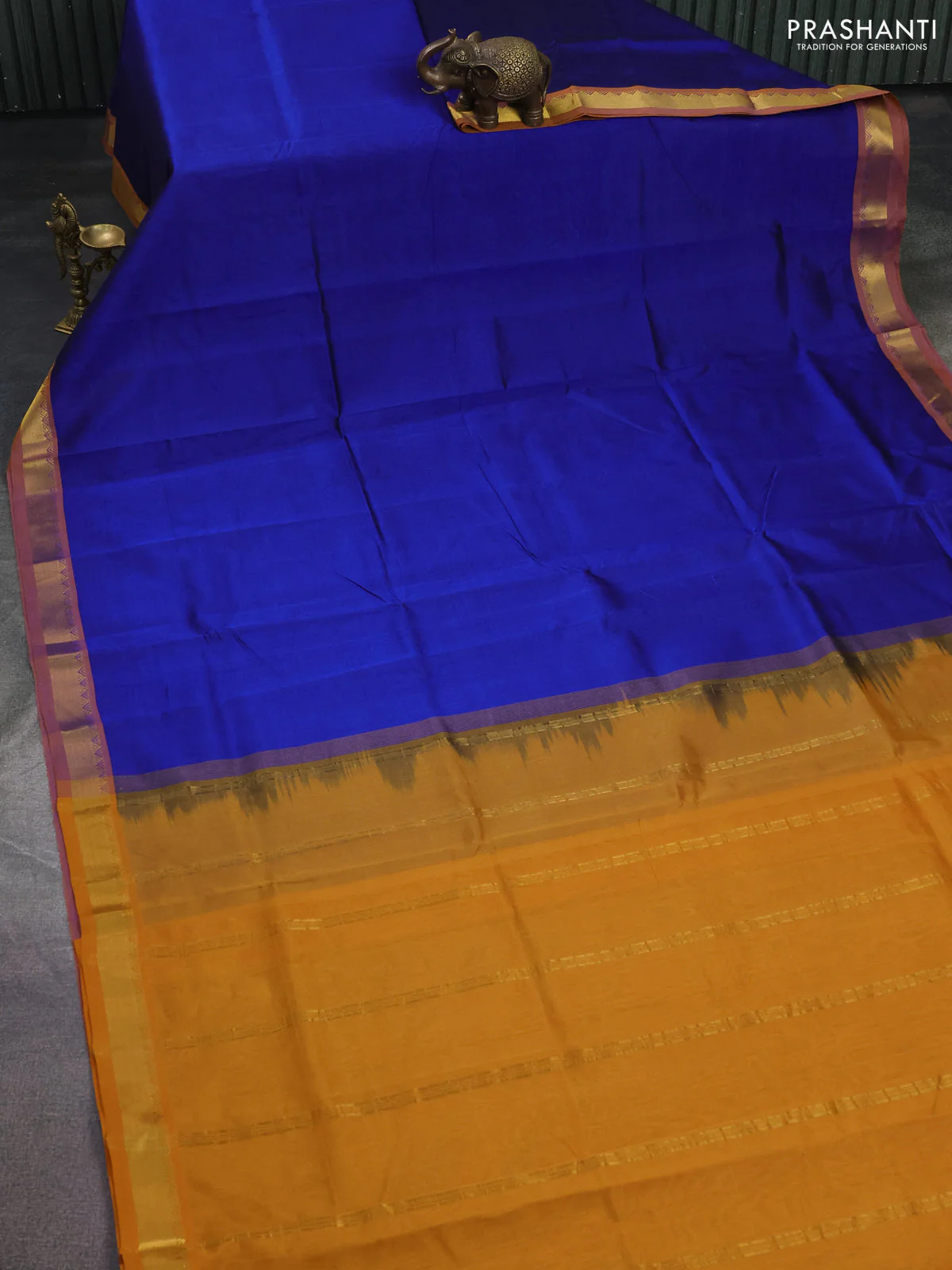 Silk cotton saree blue and mustard yellow with plain body and zari woven border - Image 2