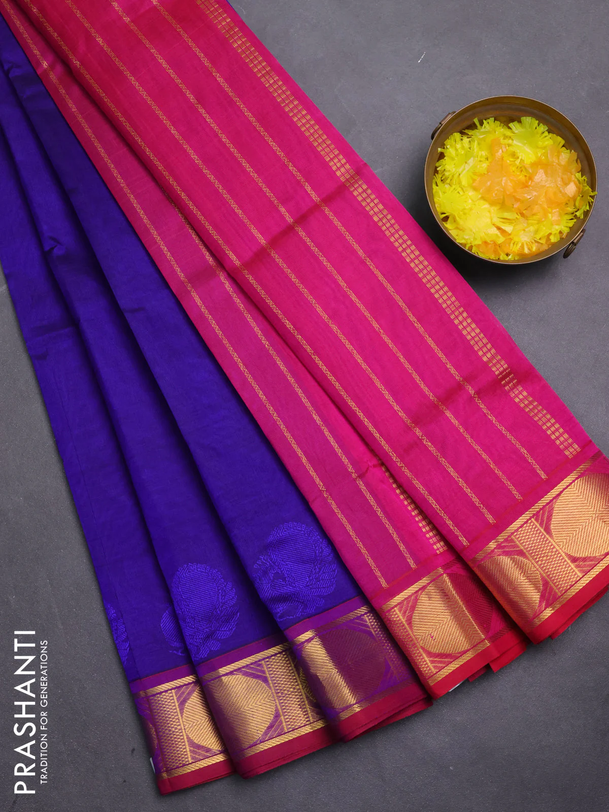 Silk cotton saree blue and pink with plain body and zari woven border