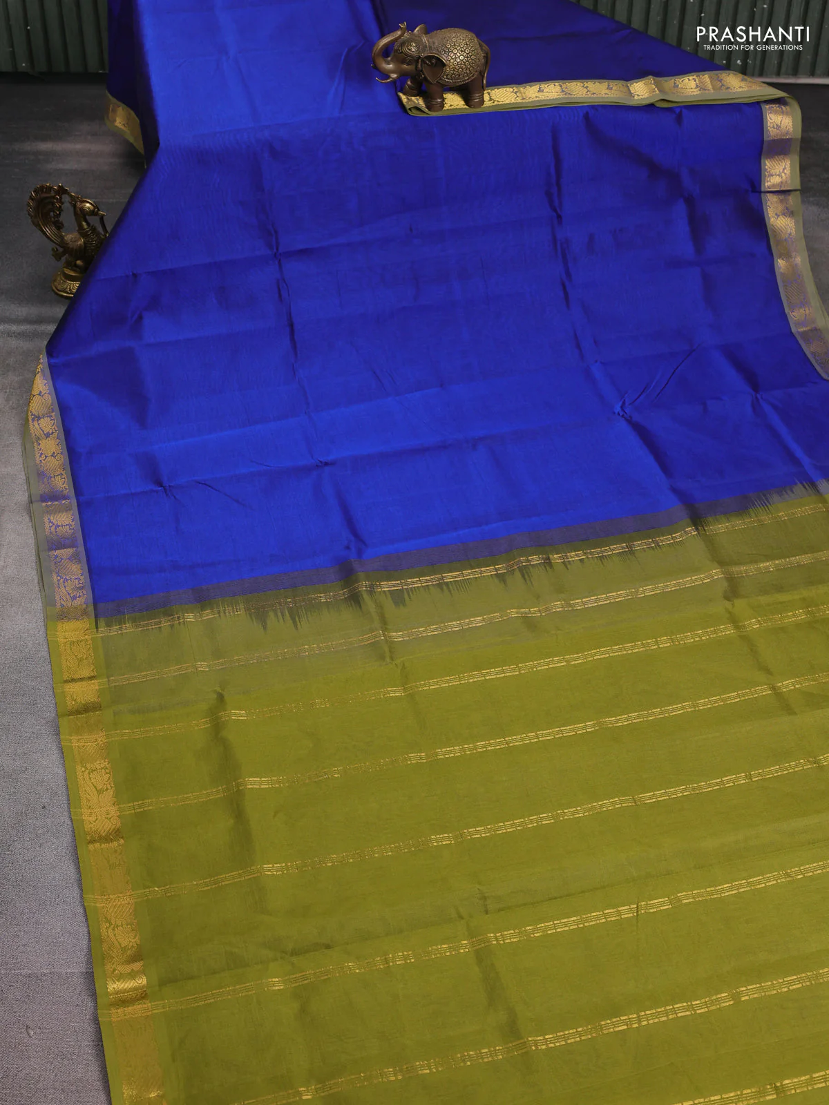 Silk cotton saree blue and sap green with plain body and peacock zari woven border - Image 2