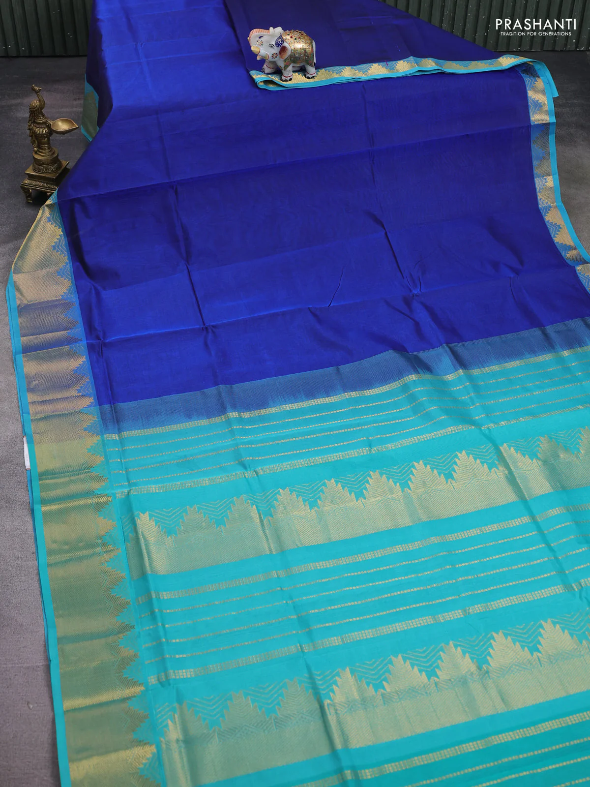 Silk cotton saree blue and teal blue with plain body and temple zari woven border - Image 2
