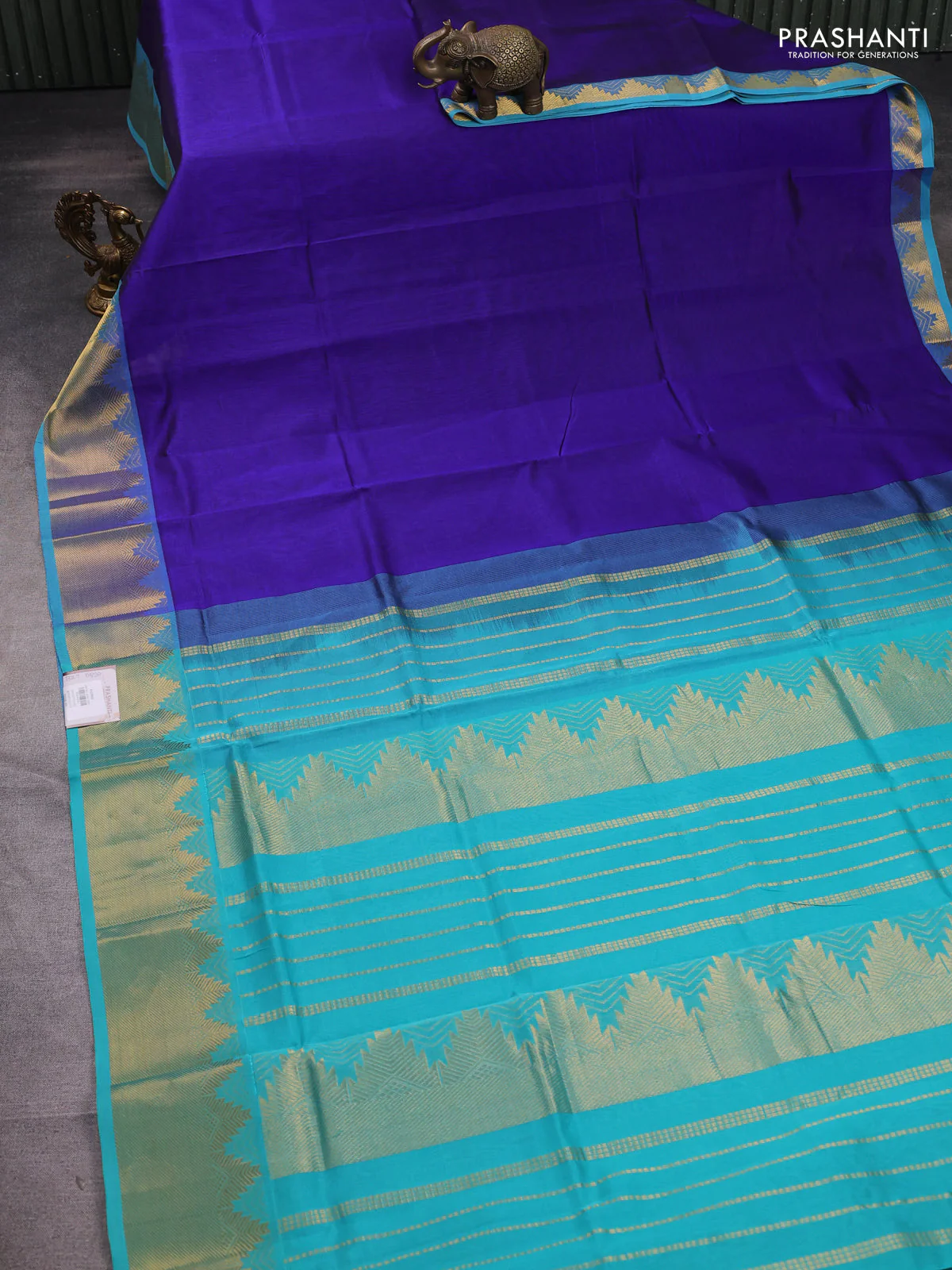 Silk cotton saree blue and teal blue with plain body and zari woven border - Image 2