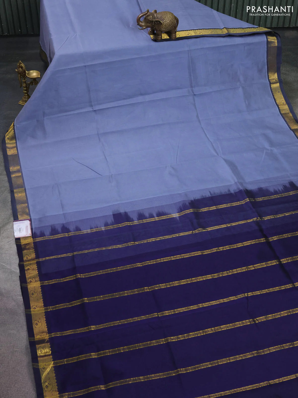 Silk cotton saree bluish grey and navy blue with plain body and zari woven border - Image 6