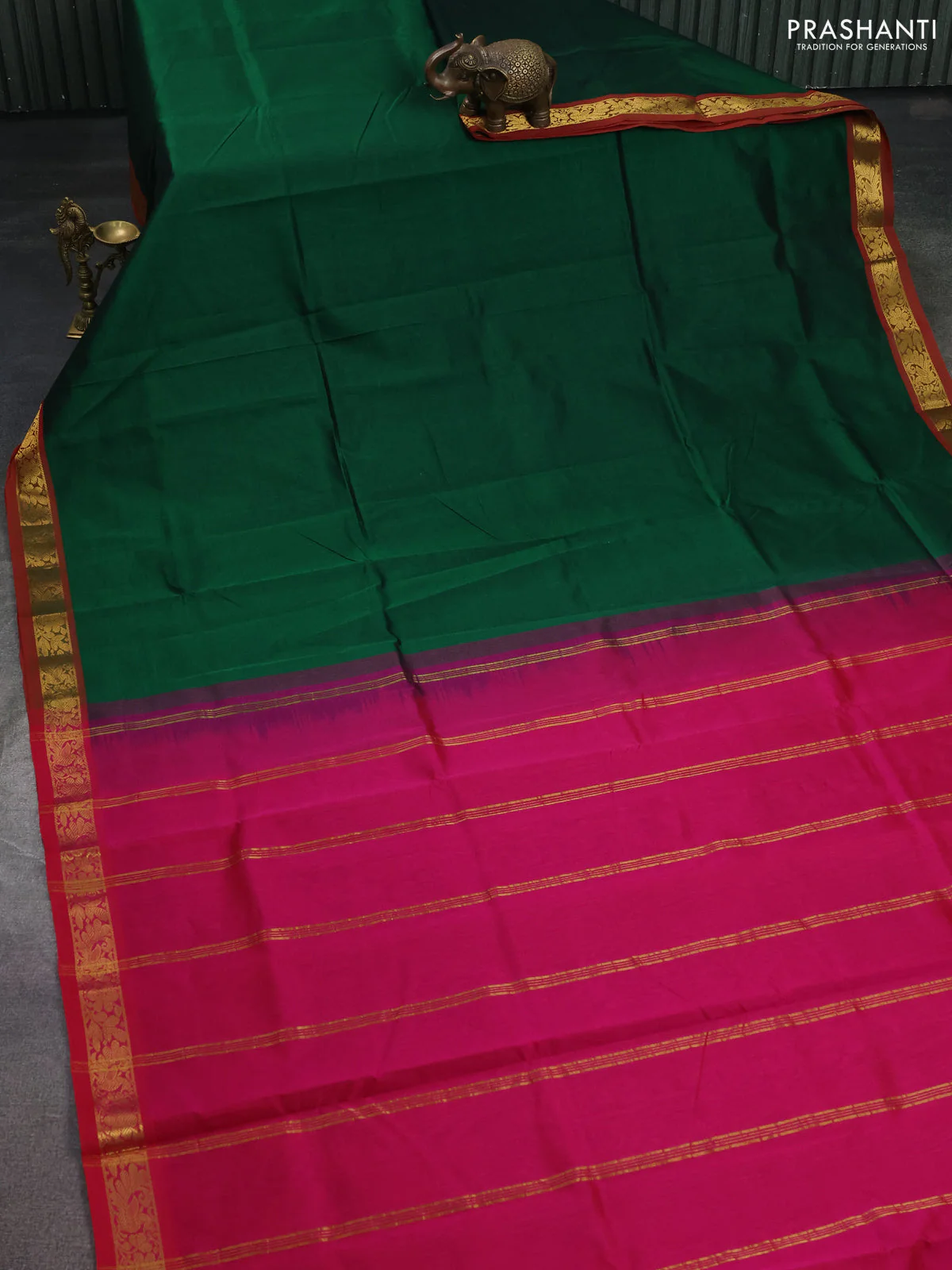 Silk cotton saree bottle green and pink with plain body and zari woven border - Image 2