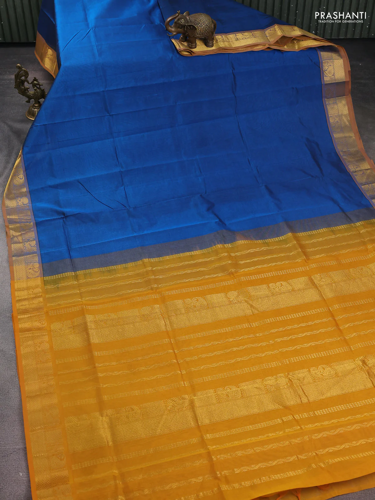 Silk Cotton saree cs ble and mustard yellow with plain body and zari woven border - Image 2