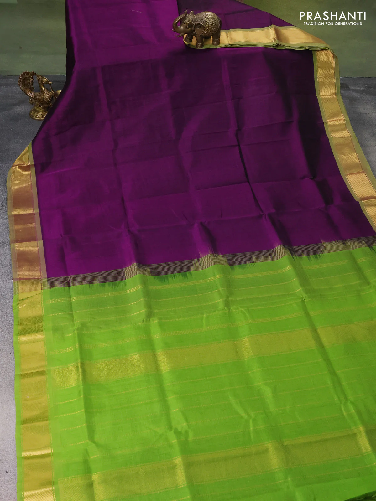 Silk cotton saree deep purple and light green with plain body and zari woven border - Image 2