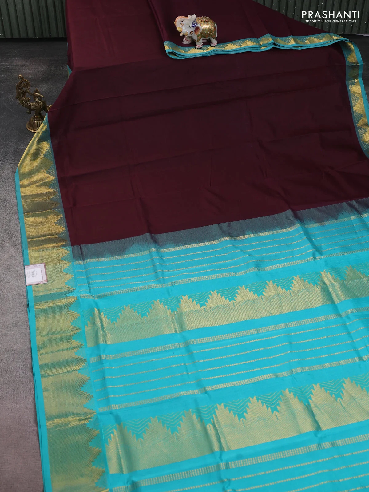 Silk cotton saree deep wine shade and teal blue with plain body and zari woven border - Image 2