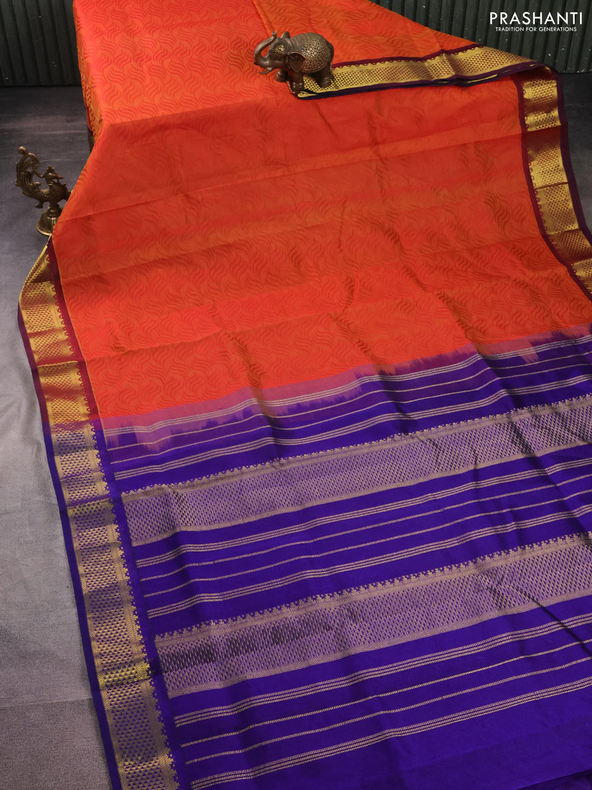 Silk cotton saree dual shade of orange and blue with allover self emboss jacquard and zari woven border - Image 2