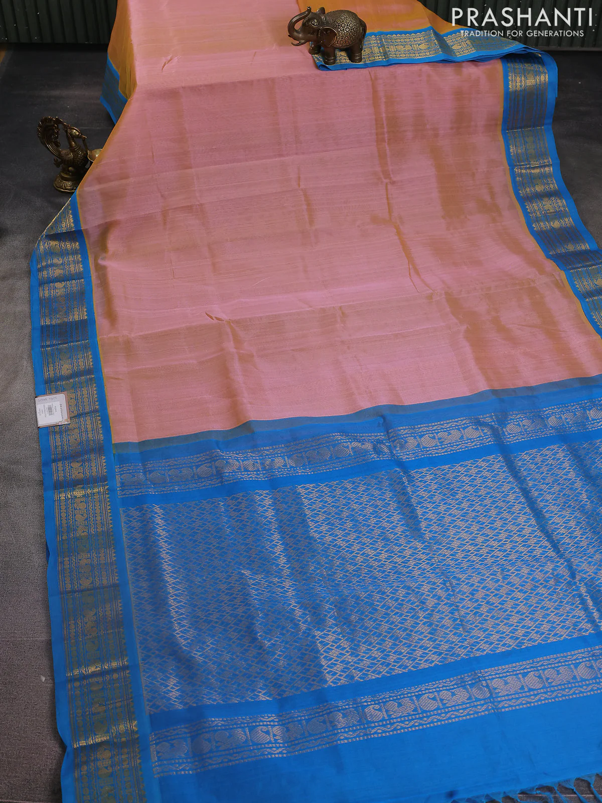 Silk cotton saree dual shade of peach and cs blue with plain body and zari woven korvai border - Image 2